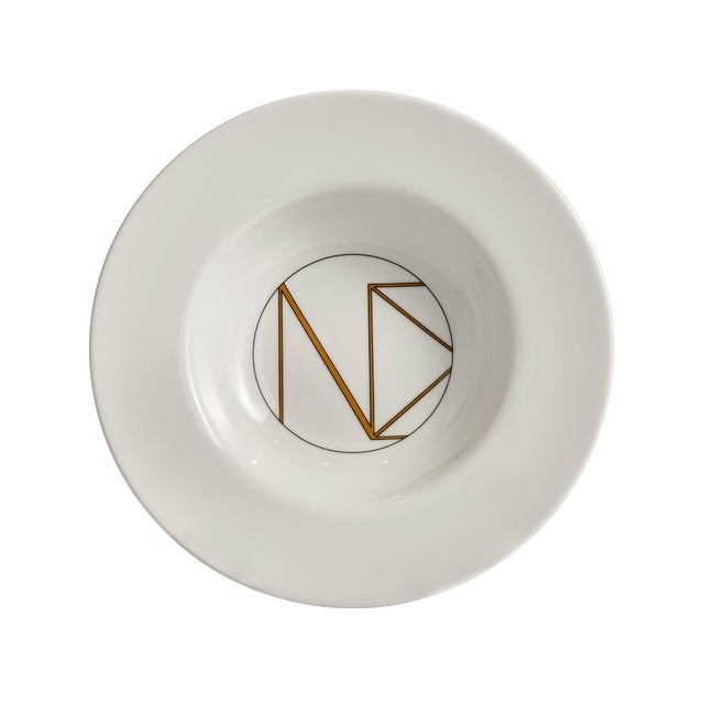 Crafted from fine porcelain, this set of four Alina Soup Plates pairs a clean, sculptural silhouette with a refined...