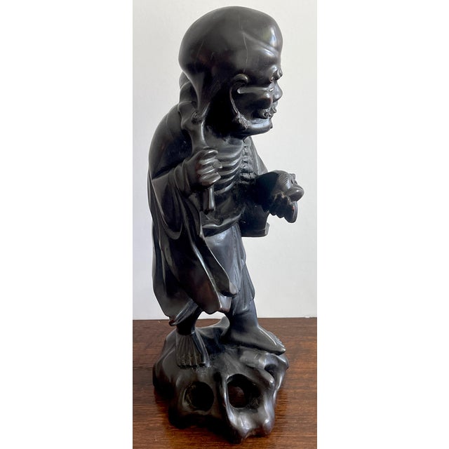 Black 19th Chinese Carved Hardwood Figure of an Immortal Holding a Bat For Sale - Image 8 of 10
