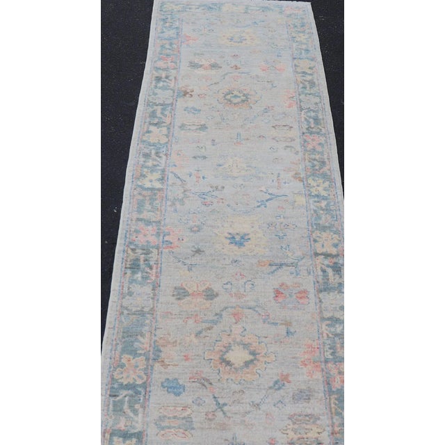 Hand Knotted Modern Oushak Runner on Light Gray Field and Colorful Motifs For Sale - Image 4 of 11