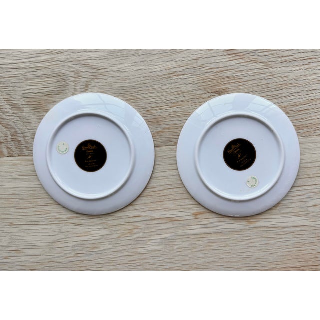 Elegant set of two Rosenthal Studio-Line porcelain dishes featuring the iconic Fornasetti Palladiana architectural motif,...