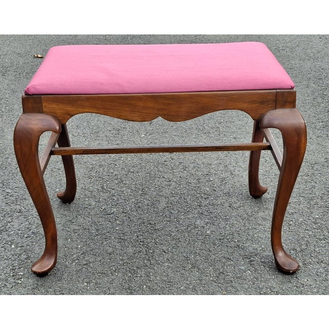 An Early 20th Century Maddox Colonial Queen Anne Style Stained Mahogany and Upholstered Stretcher Bench MEASUREMENTS:...