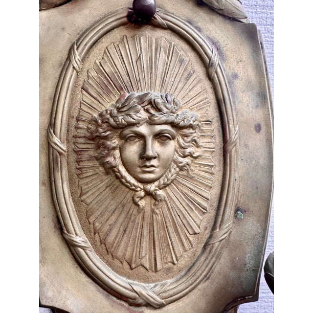 Campaign Antique Ornate Bronze French Empire Style Garland Sconce With Versace Style Sunface Detail For Sale - Image 3 of 7
