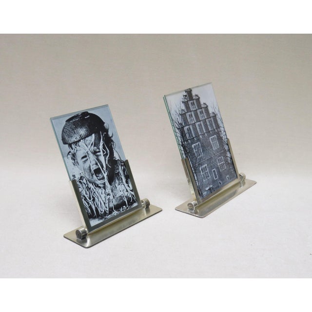 A pair of elegant, silver-plated picture frames, manufactured by WMF, Germany, in the typical, austere style of the Art...