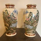 Add a touch of elegance to your home with this beautiful pair of 7-inch decorative vases. Featuring classic Japanese-...