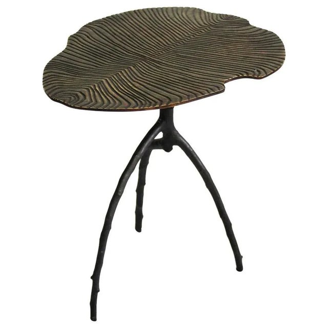 Medium fossil side table by Plumbum Signed by Eric Gizard and Plumbum Dimensions: 16.53" x 13.38" x H 15.74" Materials:...