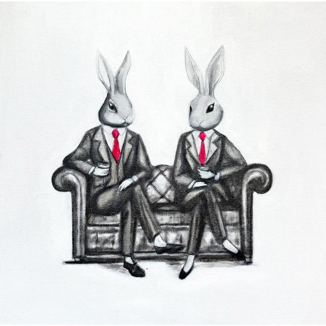 A Framed print of two bunnies drinking wine on the sofa by Max & Alma. Max and Alma create kitsch, pop, feel-good art that...