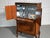 This exquisite 1940s Dry Bar is a remarkable example of Swedish Grace design, masterfully crafted from a luxurious blend...
