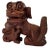 A unique pair of vintage hand carved wood foo dogs statues made of a very dark stained wood. Measurements 9” H x 10” W X...