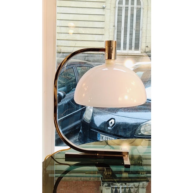 AS1C designed by Fanco Albini and Franca Helg for Sirrah is a table lamp with a structure made entirely of chrome-plated...