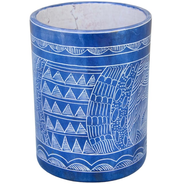 Impressive and heavy one-of-a-kind vintage West-African catchall accent handmade from natural soapstone. Showcasing an...