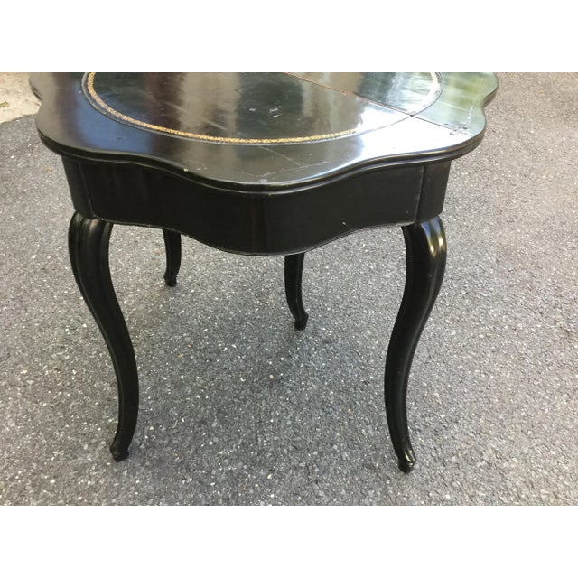 This 19th century French table is a true antique from the Napoleon lll era. This table may be used as a demi-lune when...