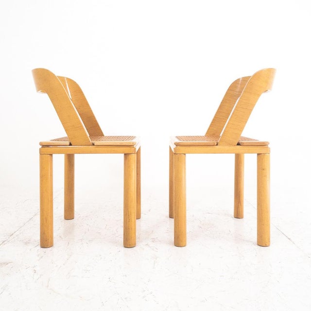 Set of two Italian manufactured chairs of RB Rossana of the 70s, the chairs are made of ash and straw wood of Vienna....