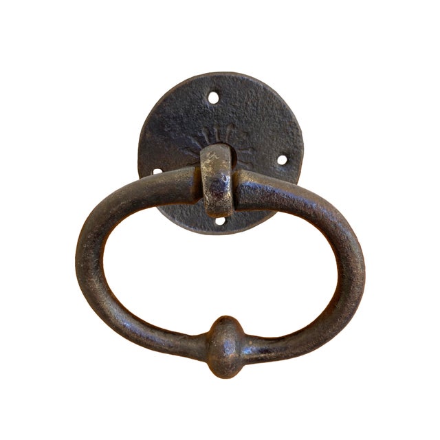 A vintage classic iron door knocker, gate and/or door pull in a dark black-bronze finish. Spanish-style hand-forged solid...