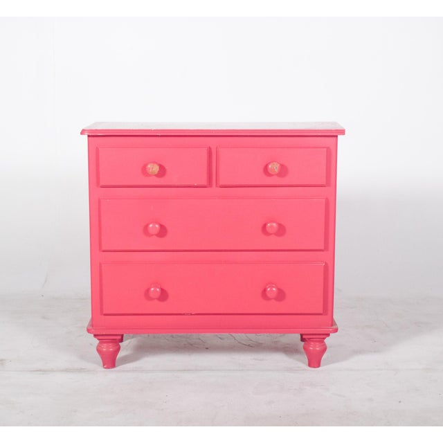 Chest of drawers painted pink. Finished in a vibrant shade of pink, the chest of drawers has a playful, contemporary feel...