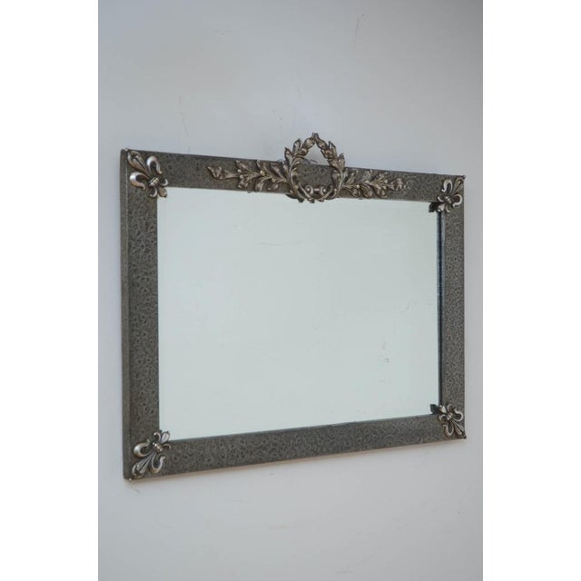 K0552 stylish arts and crafts mirror with original bevelled edge glass in metal hammered frame with fleur de lys...