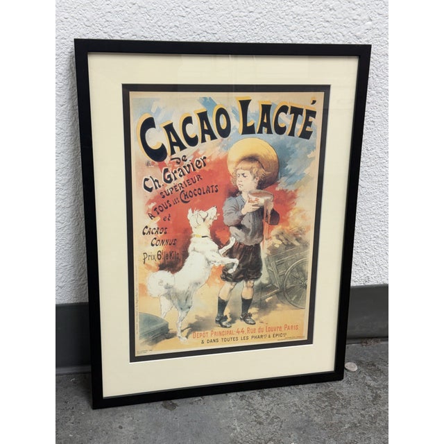 Design Plus Gallery presents a framed 1996 reproduction of the “Cacao Lacté de Ch. Gravier” chocolate advertisement. The...