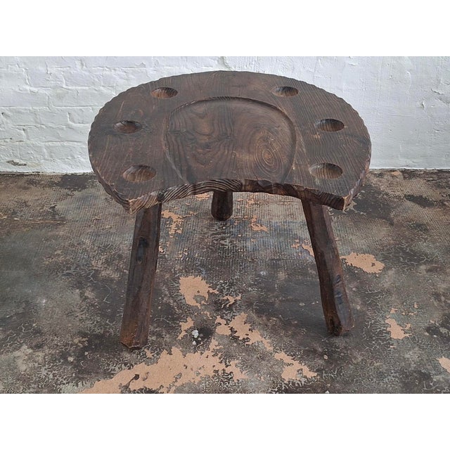 Brutalist mid century hand-carved coffee table or gaming table in the shape of a horse-shoe, 1960s.