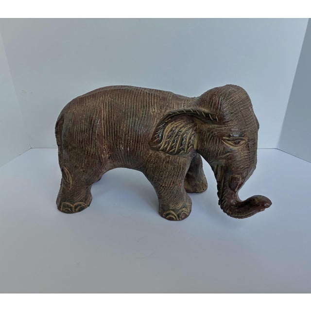 Vintage terracotta elephant sculpture. Beautiful texture and rich patina. Perfect as a garden sculpture or as a decorative...
