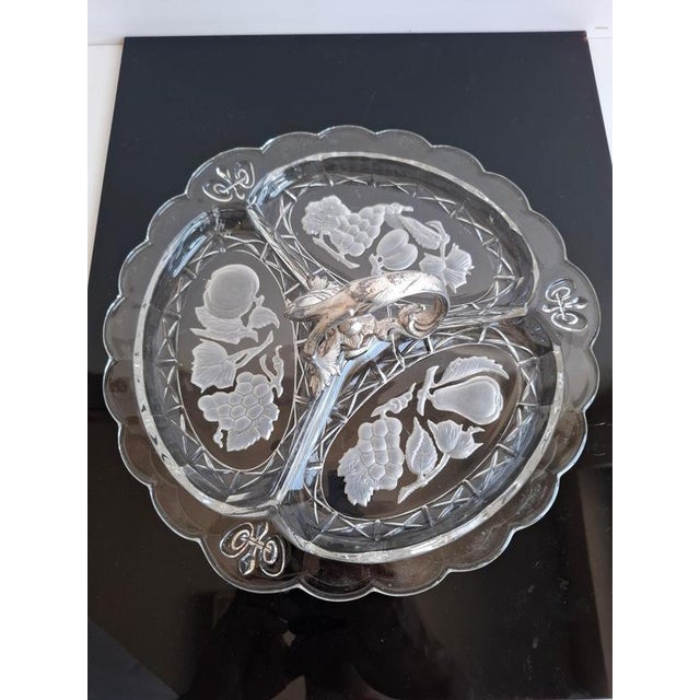 An elegant Art Deco serving dish produced in Czechoslovakia around 1930, crafted from finely pressed glass with decorative...