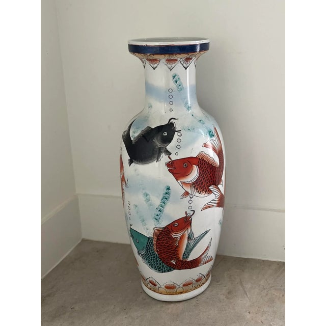 This big beauty looks great as a centerpiece set up high and is large enough to use as a floor vase or umbrella stand....