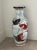 This big beauty looks great as a centerpiece set up high and is large enough to use as a floor vase or umbrella stand....