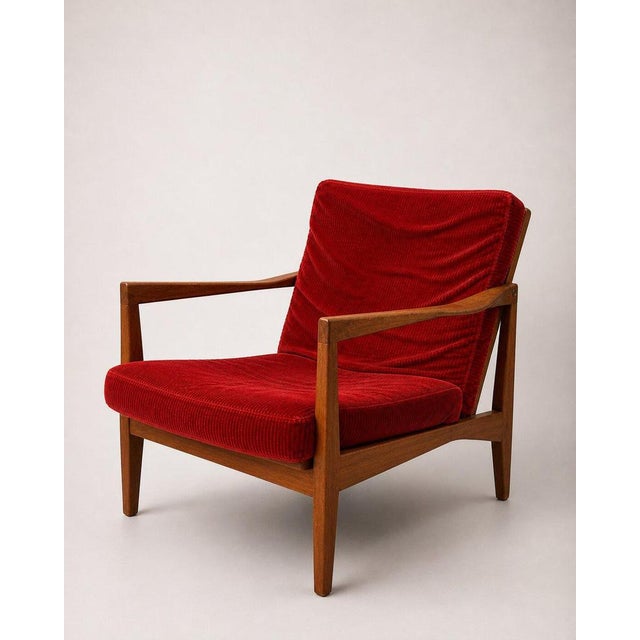 A Scandinavian modern lounge chair designed by Svante Skogh and produced by Engen, Sweden, circa 1960s. Crafted in solid...