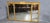A super Regency style Edwardian gilt overmantle mirror, three bevelled mirrors with surrounding gilt frame with bow and...