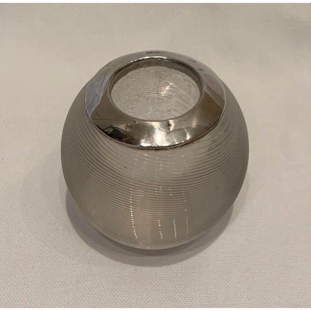 Turn-of-the-century British glass match striker with silver top. Purchased in London in the late 1980s.