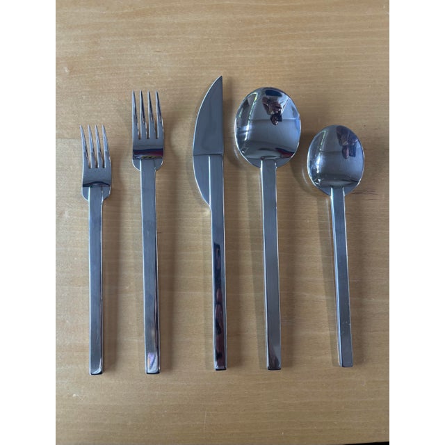 A rare and substantial 68-piece Boda Nova Stockholm stainless steel flatware service for twelve, including an unusually...