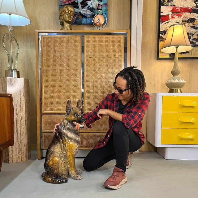 Exceptionally crafted in Italy, this near life-size German Shepherd sculpture in glazed terra cotta captures both loyalty...
