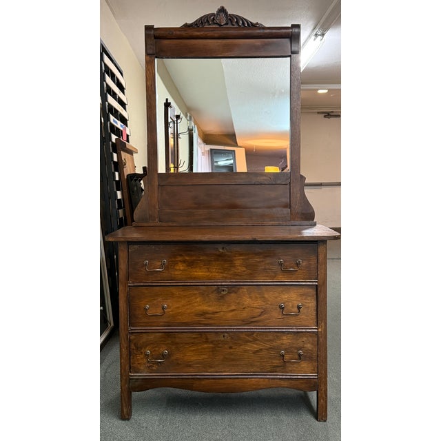 Design Plus Gallery presents a Dresser with Attached Mirror in the Eastlake Style of the Victorian Era. The dresser is...