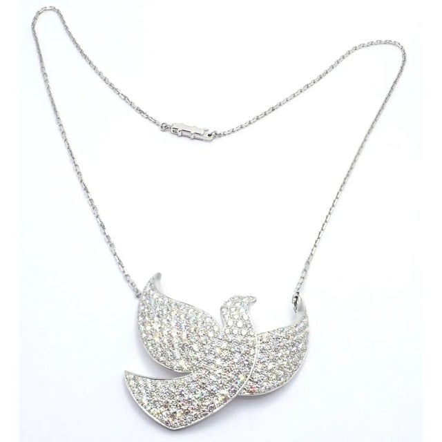 18k White Gold Colombe de la Paix Dove Of Peace Diamond Pendant Necklace by Cartier. This necklace comes with sales...