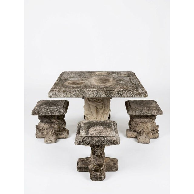Elevate your garden, terrace, or courtyard with this grand vintage cast stone outdoor dining set, featuring a square table...