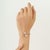 This Modernist Toi et Moi Open Cuff Bangle brings a refined, sculptural elegance to the wrist. Crafted in 925 Sterling...