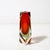 This Mid-Century Modernist hand-blown faceted Murano glass "Sommerso" vase, crafted in ruby red and transparent glass, is...