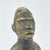 The Bakongo people Nkisi power figure from the Congo is a striking, handcrafted spiritual object used in ritual practices...