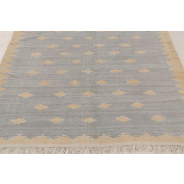 This 5x6 vintage Dhurrie flat weave is an exciting new curation from Rug & Kilim’s flatweave collection. Handwoven in...