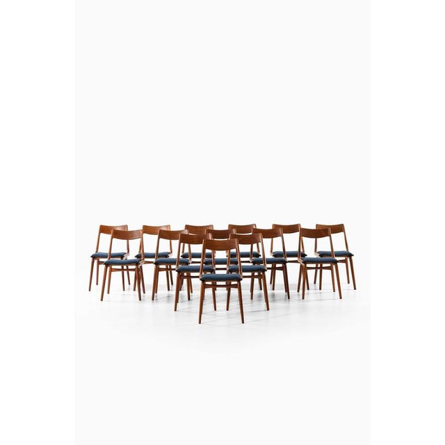 This rare set of 14 dining chairs, model 370 - also known as the boomerang chair - was designed by alfred christensen and...