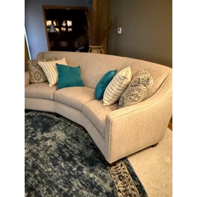 Modern curved sofa that can be altered with a change in pillows. Showpiece when you walk into a room. Modern -...