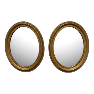 Pair of Vintage Gilt Oval Italian Mirrors For Sale