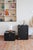 Pair of black lacquered cabinets by Roche Bobois, France, 1990s. One is a tall module with a hinged door, the other a low...