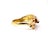 A bold and sculptural equestrian statement piece crafted in solid 14k yellow and white gold. This bypass-style ring...