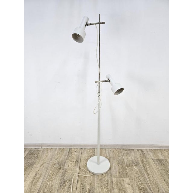 A wonderful floor lamp from the 1960s. Extremely original design and the highest quality of workmanship. Lampshades...