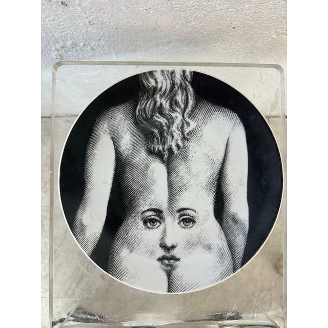 This is a vintage Italian design plate by Fornasetti, from the iconic Tema e Variazioni (Theme and Variations) series...