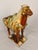 A large decorative Chinese sancai-glazed pottery figure of a caparisoned horse, produced in the Tang Dynasty style at a...