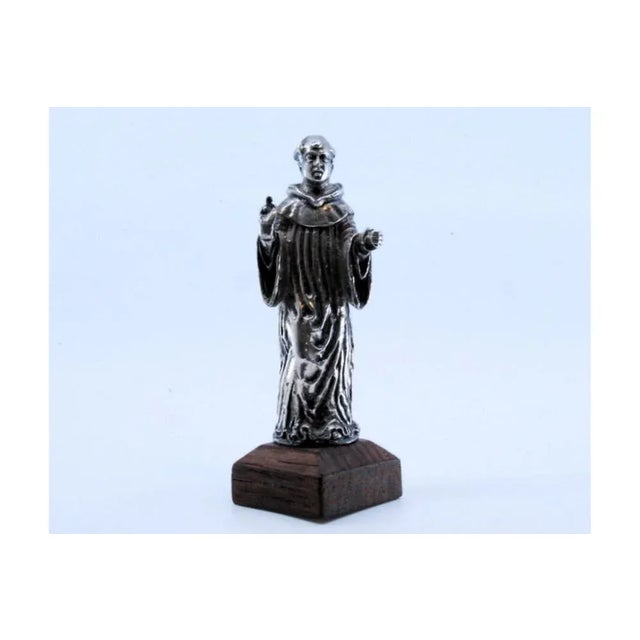 Silver Statuette of Saint Anthony with Wooden Base, in Very Good conditions. Designed from 2000 This piece has an...