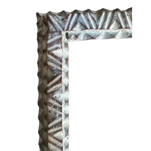 Tramp art frame with a blue wash paint. Made in the 1900s.