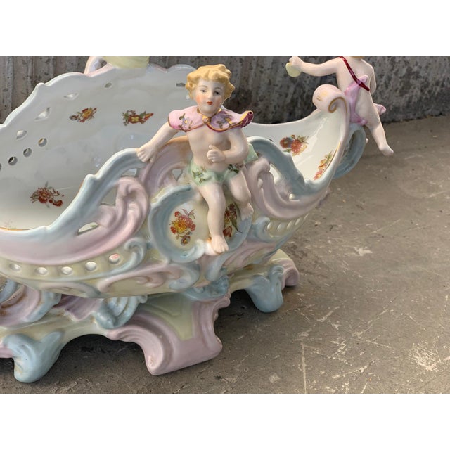 19th century Austrian porcelain centerpiece bowl or jardinière beautifully enameled in rich colors with floral sprays and...