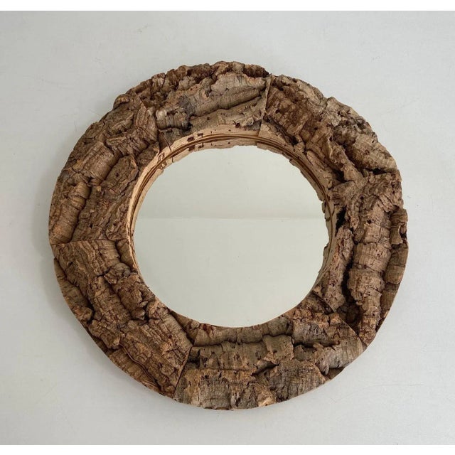 This mirror is made of cork and wood. This is a French work. Circa 1970.