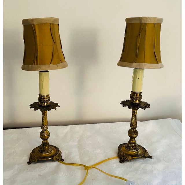 Pair early 20th Century brass candlestick lamps with custom silk shades. Perfect small size for bookshelf or small spot. I...